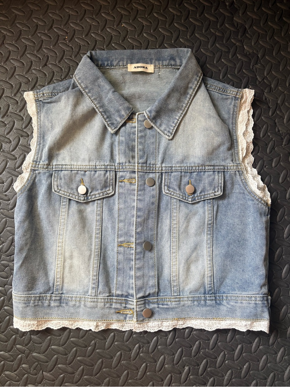 Denim vest with lace trim by Adora!
